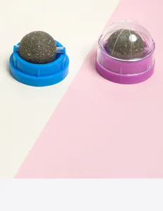 Catnip wall ball toy with rotating herb balls and transparent dust cover for pet entertainment.