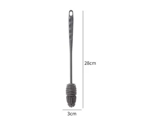 Brosse à tasse en silicone à long manche pour nettoyer bouteilles, thés et tasses.
