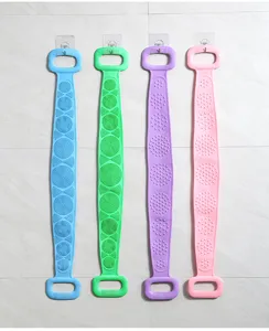 Silicone back scrubber detail showing dual-sided massage textures, soft material, and hanging handle.