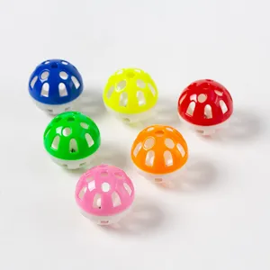 Colorful plastic cat jingle balls, hollow interactive pet toys with built-in bells for fun.