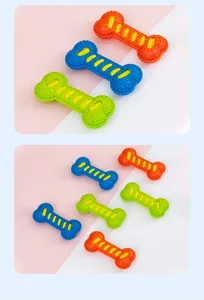 Giocattolo da masticare per cani rumoroso colorato a forma di osso bastoncino dentizione.