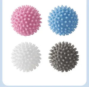 Close-up of colored silicone laundry balls with spiked texture for washing machine care.