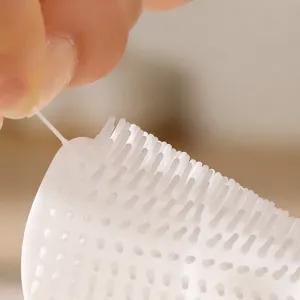 Brosse de nettoyage en silicone pour tasses avec poils souples pour les fentes et biberons.