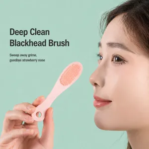 Silicone blackhead facial cleansing brush with soft bristles for deep nose pore cleaning.