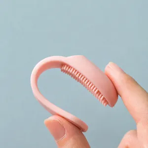 Pink silicone finger cleansing brush for facial blackhead pore cleaning main view display