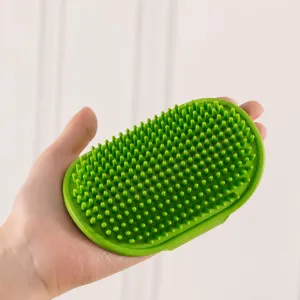 Green TPR rubber pet massage brush with round bristles for cat and dog bath and grooming.