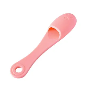 Pink silicone facial cleansing brush for blackhead removal, soft pore cleaner tool with hanging hole
