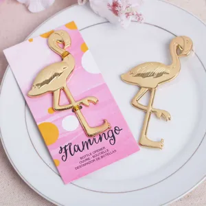 Gold flamingo bottle opener set with pink display card, perfect for wedding party favors.