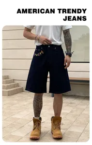 Men's loose blue denim shorts, casual streetwear style, comfortable knee-length fit.