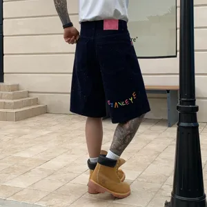 Trendy mens loose denim shorts streetwear casual five quarter pants with colorful embroidery logo