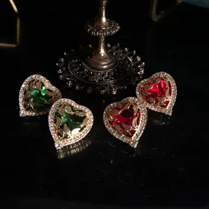 Retro vintage heart-shaped earrings with gold-plated carved leaves and dazzling rhinestones.
