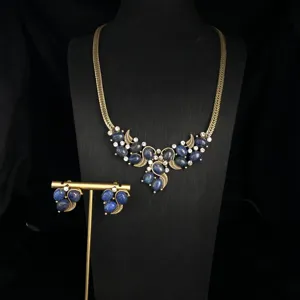 Vintage lapis lazuli rhinestone brass necklace and earrings jewelry set detail display