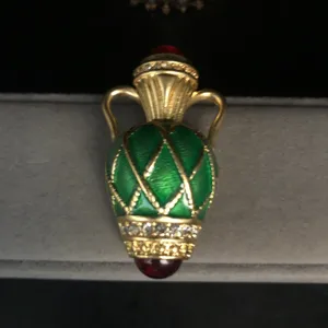 Vintage green enamel vase brooch gold tone crystal rhinestone detailed close up view