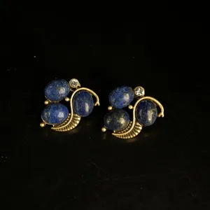 Vintage lapis lazuli rhinestone earrings detail close-up, elegant brass retro jewelry design.