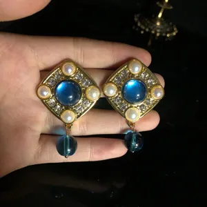 Vintage style gold tone blue gemstone rhinestone pearl drop earrings jewelry detail