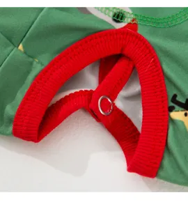 Pet clothing detail shot showing red ribbed collar and metal snap button craftsmanship.