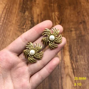 Vintage gold swirl pearl stud earrings for women, elegant copper minimalist jewelry set.