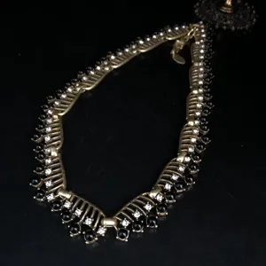 Vintage gold tone hollow black rhinestone gemstone statement necklace for women elegant jewelry
