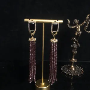 Retro long crystal tassel earrings with black rectangular studs for women fashion.