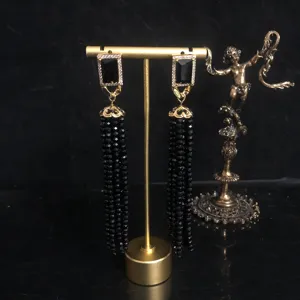 Vintage long black crystal beaded tassel earrings for women, elegant copper rhinestone design.
