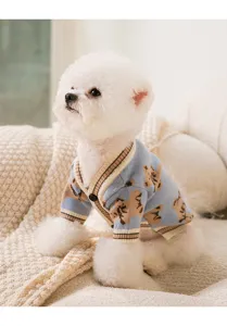 Cute teddy bear pattern pet cardigan detail, cozy blue knit dog sweater for small dogs.