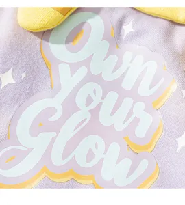 Cute pet dog vest apparel detail shot featuring soft purple fabric and lovely slogan print.