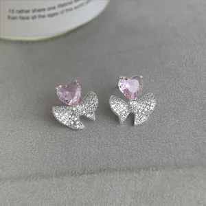 Detailansicht rosa Zirkon Schleifen Ohrringe, süßes elegantes Design für den Alltag neu.