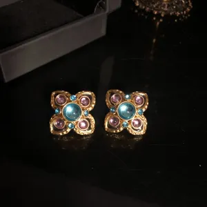 Vintage style flower earrings with blue glass and crystals for women elegant jewelry detail