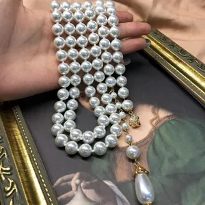 Vintage lange mehrreihige Perlenkette mit elegantem Goldanhänger Pulloverkette Schmuck