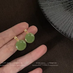 Mint green geometric round stud earrings, elegant Korean style fashion minimalist jewelry for women.