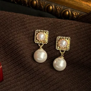 Vintage French style geometric pearl drop earrings, elegant gold-toned designer jewelry for women.
