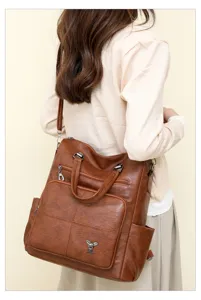 Stylish brown PU leather women backpack, vintage large capacity casual travel bag.