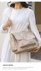 Detail view of large capacity casual messenger bag with wide strap and flap design for daily use.