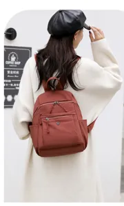 Sac à dos imperméable femme casual voyage cartable léger petit sac de voyage élégant