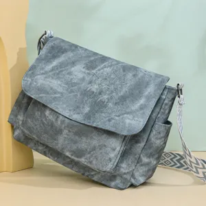 Stylish large capacity canvas messenger bag for women, retro casual crossbody shoulder bag.