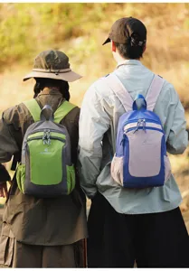 Outdoor travel backpack detail showcasing color-blocking design and dual side mesh pockets.