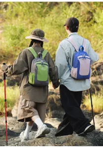 Outdoor hiking scene detail of color-matching casual backpack showcasing dual strap and pocket design.