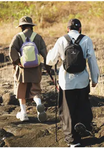 Lightweight large capacity backpack for outdoor travel, casual unisex school bookbag.