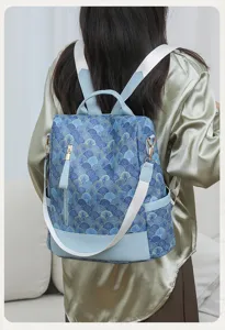Schicker chinesischer Damen Rucksack mit blauem Wellenmuster, stilvolle Schultasche.