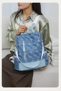 Stilvoller blauer Muster Damen Rucksack mit Ledereinsatz, lässiger Alltags Schulrucksack.