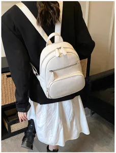 Stylish white leather mini backpack for women, casual daily wear school bag and daypack.