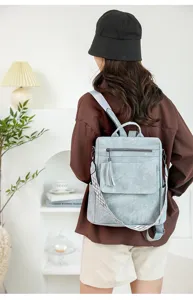 Zaino antifurto casual alla moda da donna con tracolla larga e dettaglio con nappe.
