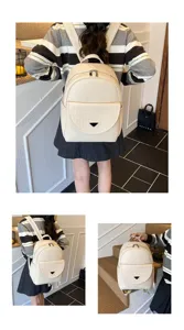 Women's PU leather backpack casual travel daypack solid color elegant school bag daily use.