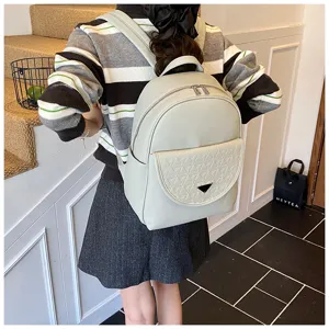 Mint green PU leather backpack detail, fashionable travel daypack with front pocket style.