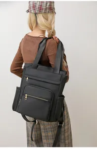 Women black oxford backpack laptop travel tote bag back view detail showcasing multi pockets.
