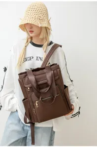 Detailed view of a versatile brown oxford cloth backpack and tote bag with multiple pockets.