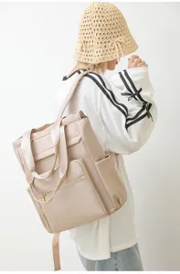 Stylish khaki dual-use backpack for women, spacious casual travel daypack and casual tote bag.