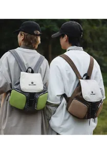 Detailed view of the casual nylon backpack showcasing front pocket and flap design details.