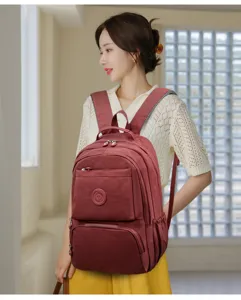Zaino da viaggio in nylon con scomparti multipli, grande capacità per studenti e uso quotidiano.