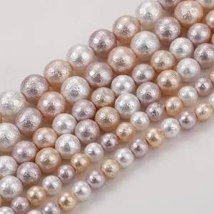 Close-up of mixed color wrinkled cotton pearl beads for DIY jewelry bracelet crafting